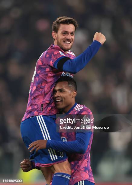 Daniele Rugani of Juventus celebrates with team mate Alex Sandro after Danilo scored to give the side a 1-0 lead during the Serie A match between...