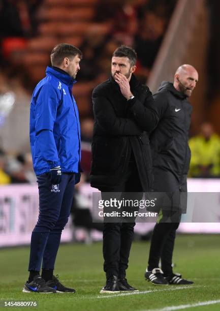 Middlesbrough head coach Michael Carrick speaks with coach Jonathan Woodgate on the touchline during the Emirates FA Cup Third Round match between...