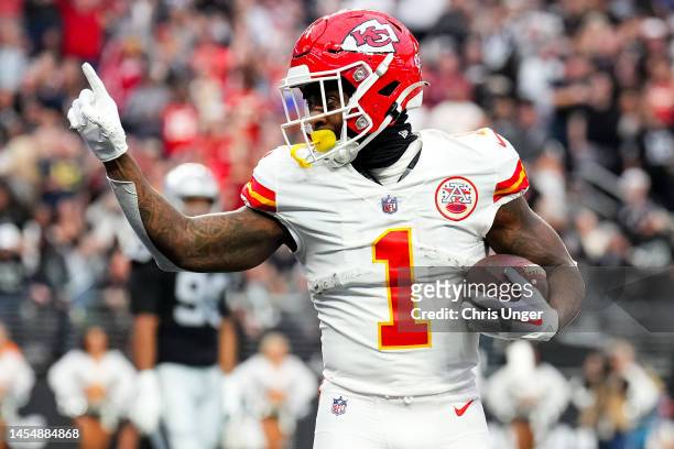 Jerick McKinnon of the Kansas City Chiefs celebrates after scoring a touchdown against the Las Vegas Raiders during the first quarter of the game at...