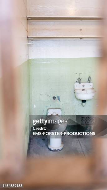 prison cell on alcatraz island - inside alcatraz prison stock pictures, royalty-free photos & images