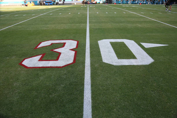 Detailed view of the painted 30-yard line to honor Damar Hamlin of the Buffalo Bills prior to a game between the Jacksonville Jaguars and the...