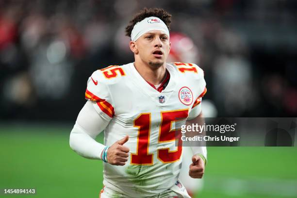 Patrick Mahomes of the Kansas City Chiefs runs off the field after the first half against the Las Vegas Raiders at Allegiant Stadium on January 07,...