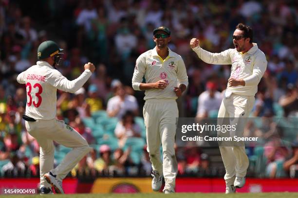 Travis Head of Australia celebrates dismissing Marco Jansen of South Africa during day five of the Third Test match in the series between Australia...