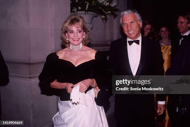 Married American couple, broadcast journalist Barbara Walters and businessman & tv producer Merv Adelson , attend the Met Gala at the Metropolitan...
