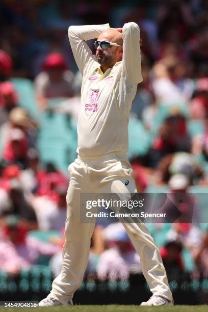 Nathan Lyon of Australia reacts during day five of the Third Test match in the series between Australia and South Africa at Sydney Cricket Ground on...