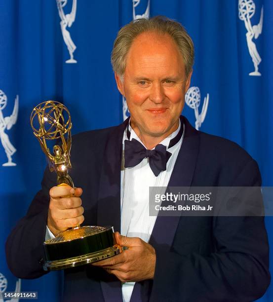 September 08 - Winner John Lithgow backstage at the Emmy Awards, September 8, 1996 in Pasadena, California.