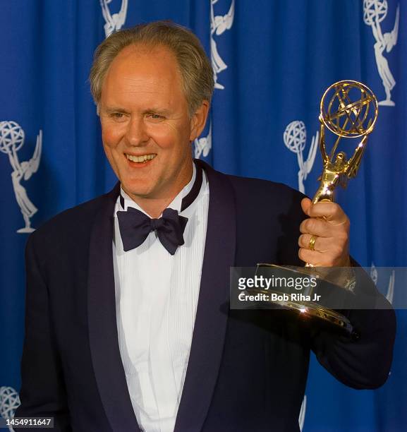 September 08 - Winner John Lithgow backstage at the Emmy Awards, September 8, 1996 in Pasadena, California.