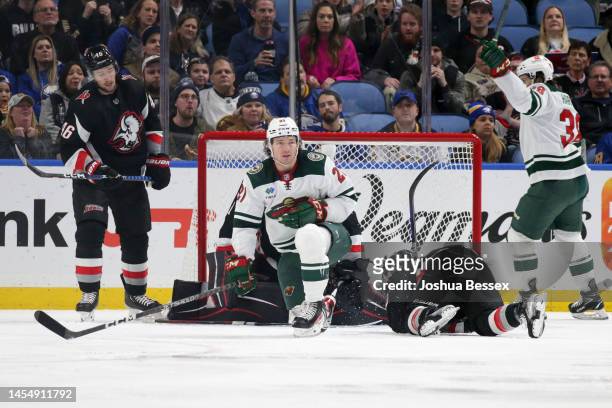Brandon Duhaime of the Minnesota Wild gets up after scoring a goal during the second period of an NHL hockey game against the Buffalo Sabres at...