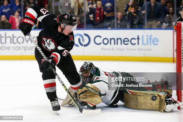 Marc-Andre Fleury of the Minnesota Wild blocks a shot by Jeff Skinner of the Buffalo Sabres during an overtime period of an NHL game at KeyBank...
