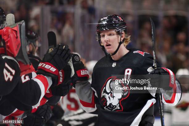 Rasmus Dahlin of the Buffalo Sabres celebrates with teammates after scoring a goal during the third period of an NHL hockey game against the...