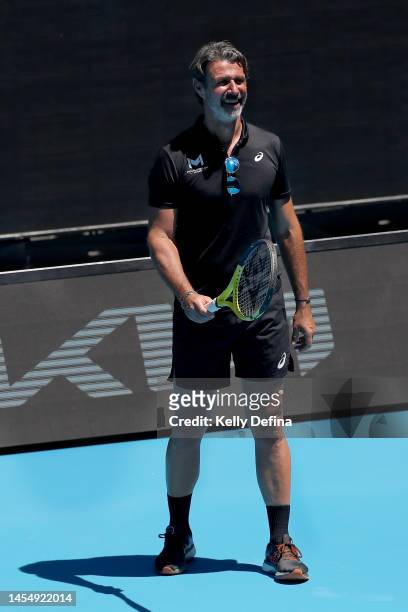 Patrick Mouratoglou looks on as Holger Rune of Denmark trains during a practice session ahead of the 2023 Australian Open at Melbourne Park on...