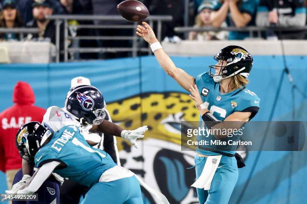 Trevor Lawrence of the Jacksonville Jaguars attempts a pass during the second quarter against the Tennessee Titans at TIAA Bank Field on January 07,...