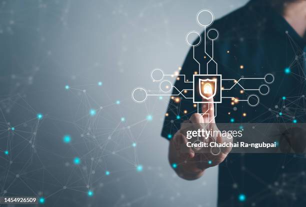 cyber protection data security internet privacy, internet and technology concept on virtual screen. man touching on lock icon. - risico stockfoto's en -beelden