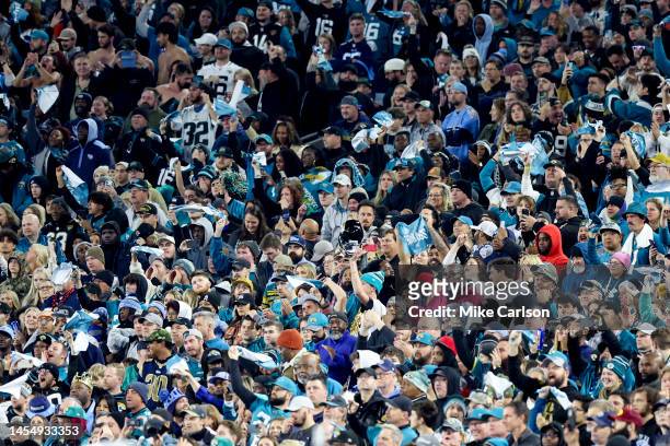 Fans cheer during a game between the Tennessee Titans and the Jacksonville Jaguars at TIAA Bank Field on January 07, 2023 in Jacksonville, Florida.