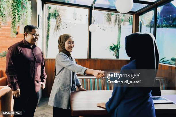 business meeting at the restaurant - indonesia business stock pictures, royalty-free photos & images