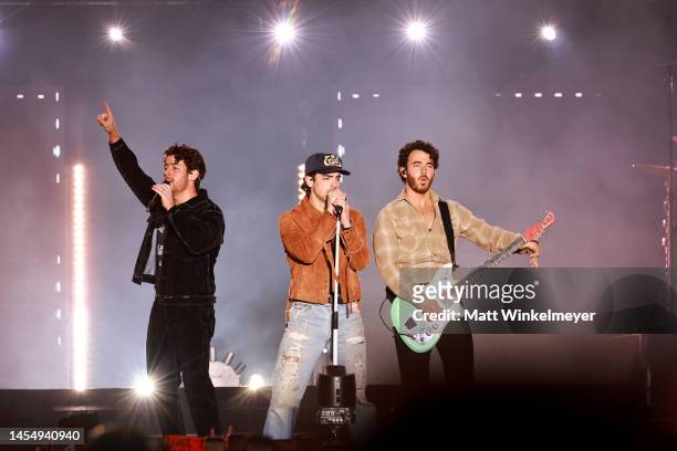 Nick Jonas, Joe Jonas and Kevin Jonas of The Jonas Brothers performs onstage during AT&T Playoff Playlist Live at Banc of California Stadium on...