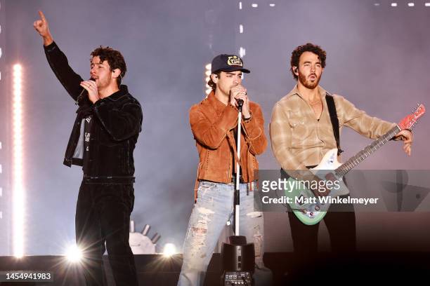Nick Jonas, Joe Jonas and Kevin Jonas of The Jonas Brothers perform onstage during AT&T Playoff Playlist Live at Banc of California Stadium on...