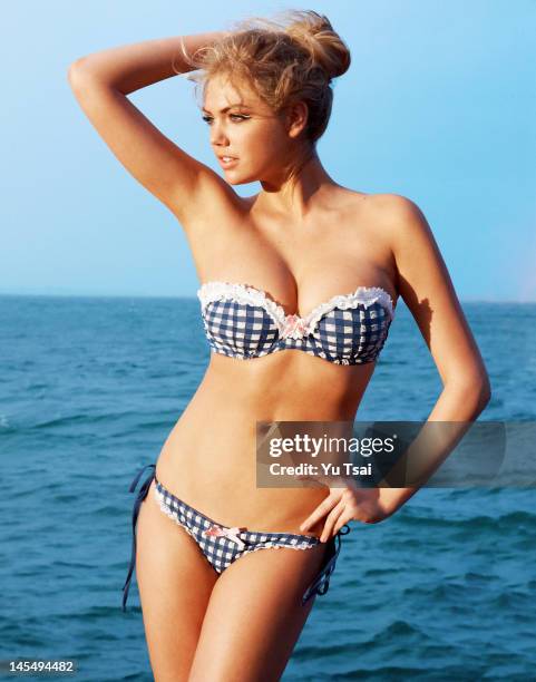 Model Kate Upton is photographed for Beach Bunny on January 14, 2012 in Belize City, Belize.