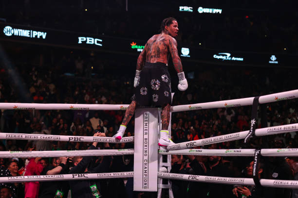 Gervonta Davis celebrates after defeating Hector Luis Garcia in their WBA World Lightweight Championship bout at Capital One Arena on January 7, 2023...