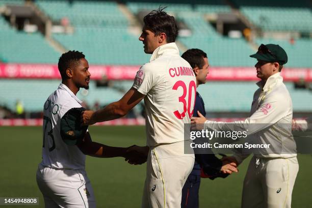 Pat Cummins of Australia shakes hands with Khaya Zondo of South Africa during day five of the Third Test match in the series between Australia and...