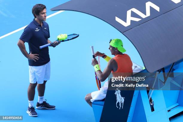 Rafael Nadal of Spain regrips his racquet during a practice session ahead of the 2023 Australian Open at Melbourne Park on January 08, 2023 in...