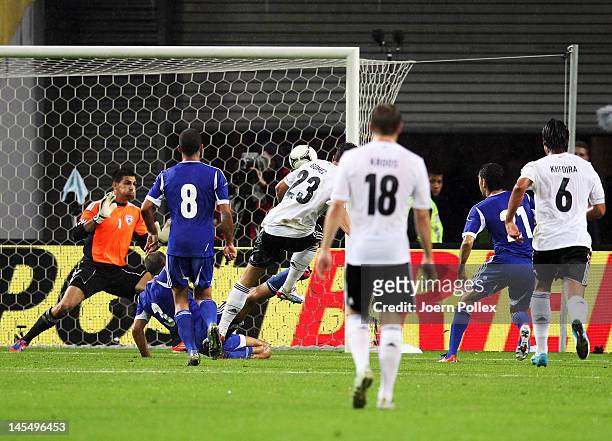 Mario Gomez of Germany scores his team's first goal during the international friendly match between Germany and Israel at Zentralstadion on May 31,...