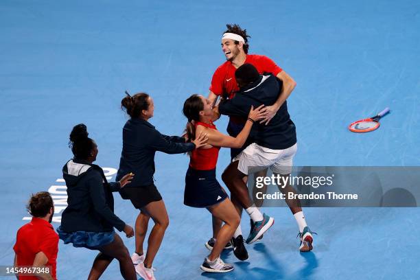 Taylor Fritz of the USA celebrates championship point with his team mates following in his final against Matteo Berrettini of Italy during day eleven...