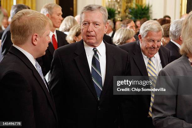 Former Attorney General John Ashcroft attends the unveiling ceremony of former President George W. Bush's offical portrait in the East Room of the...