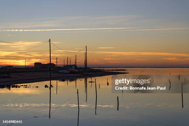 sunrise on bages pond - aude stock pictures, royalty-free photos & images