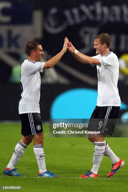 Andre Schuerrle of Germany celebrates the second goal with Philipp Lahm of Germany during the International friendly match between Germany and Israel...