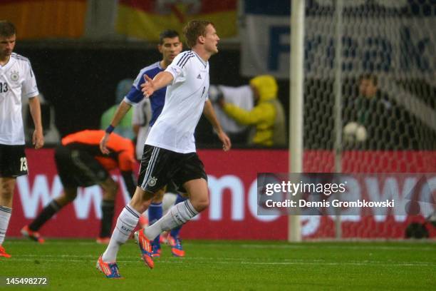 Andre Schuerrle of Germany celebrates after scoring his team's second goal during the International friendly match between Germany and Israel at...