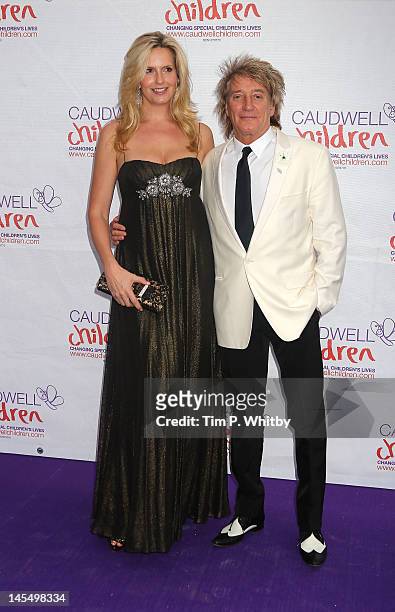 Penny Lancaster and Rod Stewart attend The Diamond Butterfly Ball in aid Of Caudwell Children at Battersea Evolution on May 31, 2012 in London,...