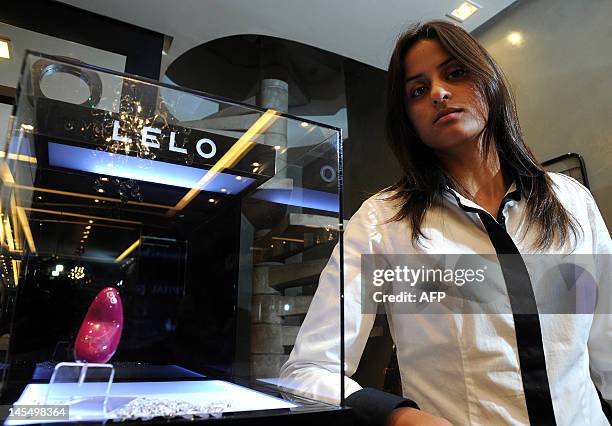 Erotika Luxo sex shop owner Ana Lucia Teixeira pictured at her store in Brasilia on May 31, 2012. A gold-plated vibrator worth 8,000 real that was...