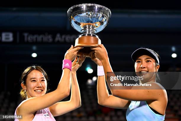 Miyu Kate of Japan and Aldila Sutjiadi of Indonesia celebrate after winning the women's doubles final against Leylah Fernando of Canada and Bethanie...