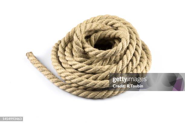 twisted thick ship ropes with knot isolated background - thick rope stock pictures, royalty-free photos & images