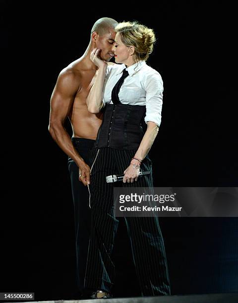 Madonna performs on stage during her "MDNA" tour with dancer Brahim Zaibat at Ramat Gan Stadium on May 31, 2012 in Tel Aviv, Israel.