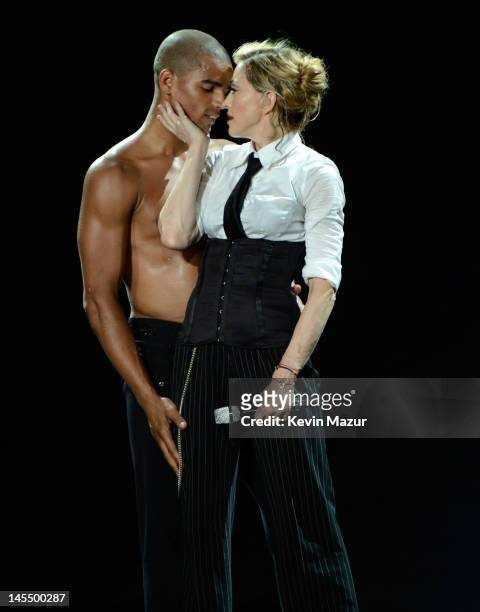Madonna performs on stage during her "MDNA" tour with dancer Brahim Zaibat at Ramat Gan Stadium on May 31, 2012 in Tel Aviv, Israel.