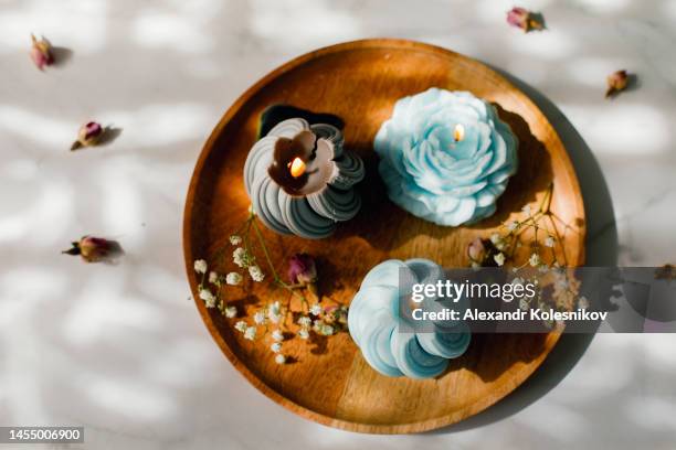 handmade natural wax and soy burning candles. gray and blue form candles. concept of home decoration and interior. mental health, self care, mindfulness lifestyle concept. - candle overhead stock pictures, royalty-free photos & images