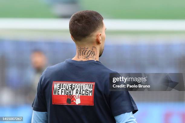 Mattia Zaccagni of SS Lazio wears a 'We love football, we fight racism' shirt during the warm up prior to the Serie A match between SS Lazio and...