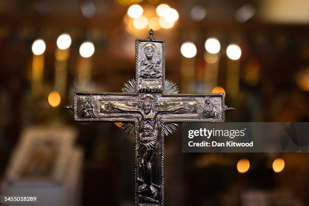 Parishioners and clergy of the Greek Orthodox Church of St Michael the Archangel attend a service for the Feast of the Epiphany ahead of the Blessing...
