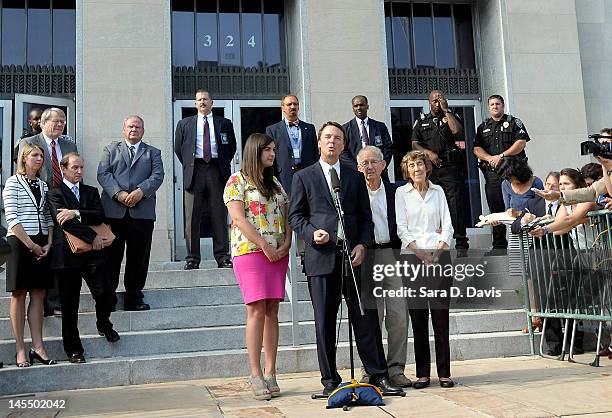 Former U.S. Sen. John Edwards addresses the media alongside his daughter Cate Edwards and his parents Wallace and Bobbie Edwards at the federal court...