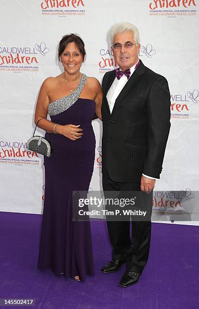 Jo Clifford and Max Clifford attend The Diamond Butterfly Ball in aid Of Caudwell Children at Battersea Evolution on May 31, 2012 in London, England.