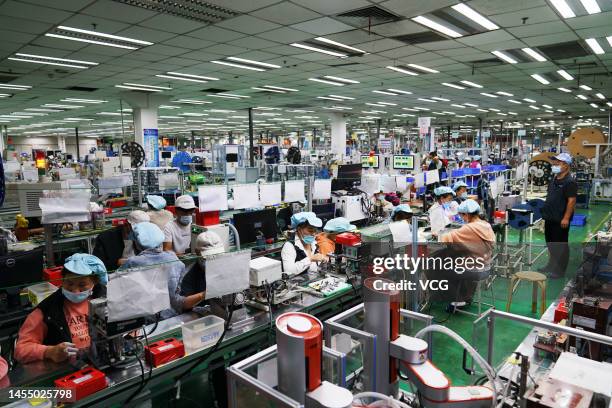 Employee work at a Foxconn factory on September 4, 2021 in Zhongmu County, Zhengzhou City, Henan Province of China.