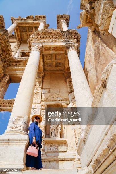tourist senior women enjoy exploring the ancient city of ephesus, - ephesus 個照片及圖�片檔