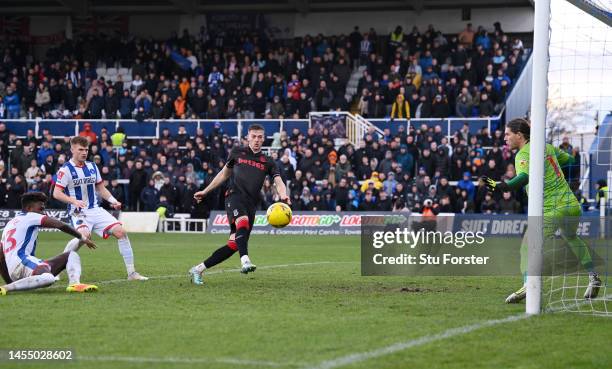 Liam Delap of Stoke City looks to shoot as Rollin Menayese of Hartlepool United scores an own goal for the Stoke City third goal during the Emirates...