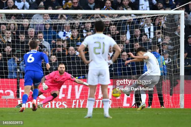 Jak Alnwick of Cardiff City saves a penalty taken by Rodrigo Moreno of Leeds United during the Emirates FA Cup Third Round match between Cardiff City...