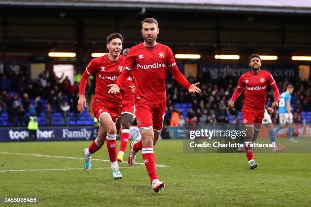 Andy Williams of Walsall celebrates after scoring the team's second goal from the penalty spot during the Emirates FA Cup Third Round match between...