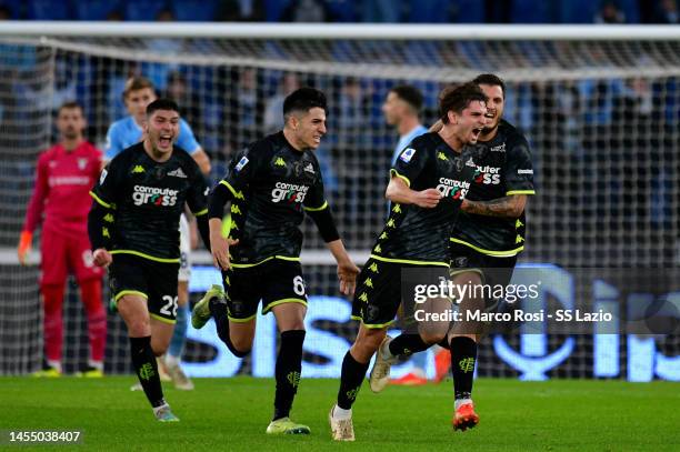 Răzvan Gabriel Marin of Empoli FC celebrates scoring his team's second goal, a late equaliser, with his team-mates during the Serie A match between...