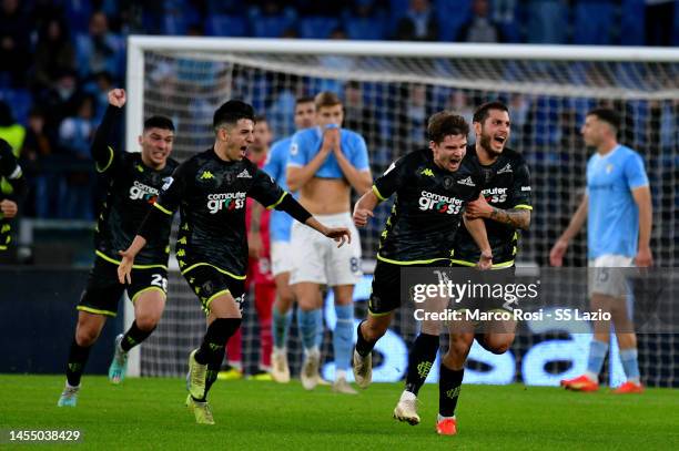 Răzvan Gabriel Marin of Empoli FC celebrates scoring his team's second goal, a late equaliser, with his team-mates during the Serie A match between...