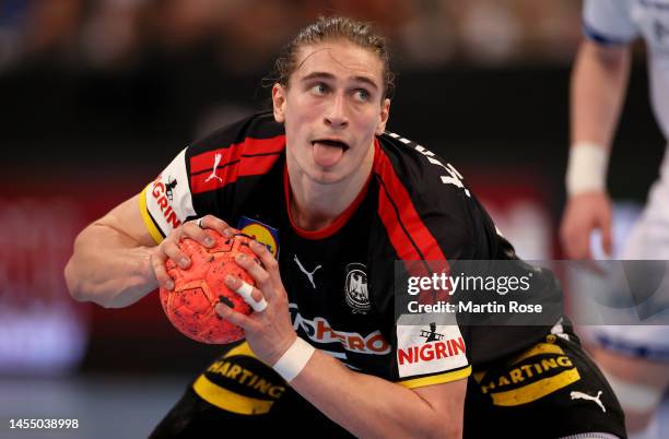 Juri Knorr of Germany controls the ball during the handball international friendly match between Germany and Iceland at ZAG-Arena on January 08, 2023...